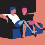 Guy is relaxing on the couch watching TV with a pink-haired woman. His hand is resting on the woman’s thigh. They are both sitting in the same position, right leg crossed over left.