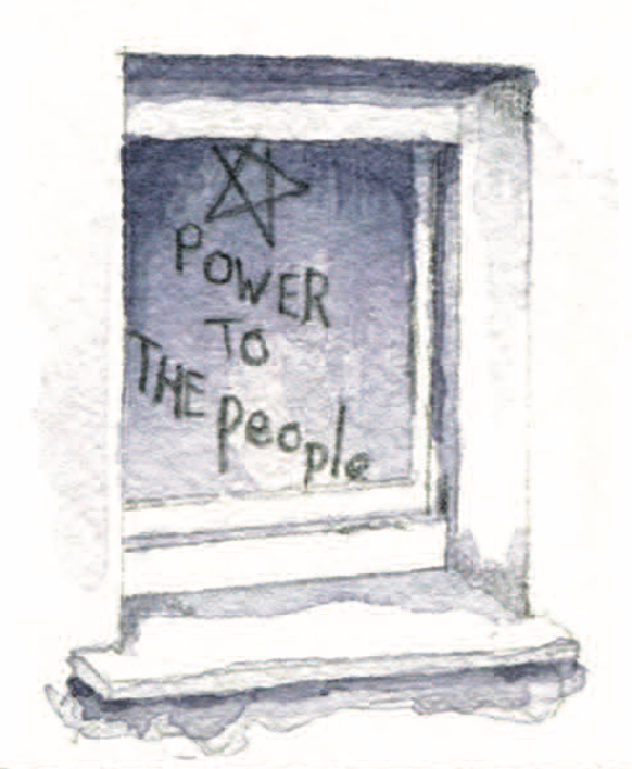 A window is covered with graffiti of a star and the text “Power to the people”